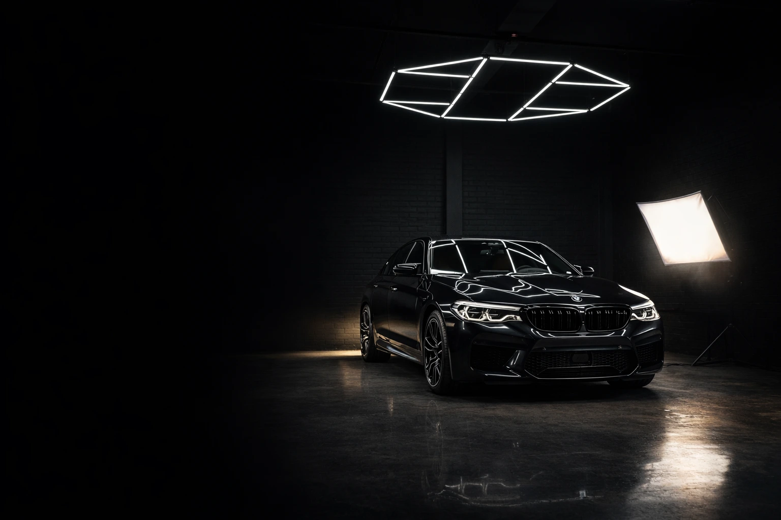 BMW black under studio lighting